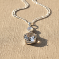 Rock Quartz Pendant - linen background
